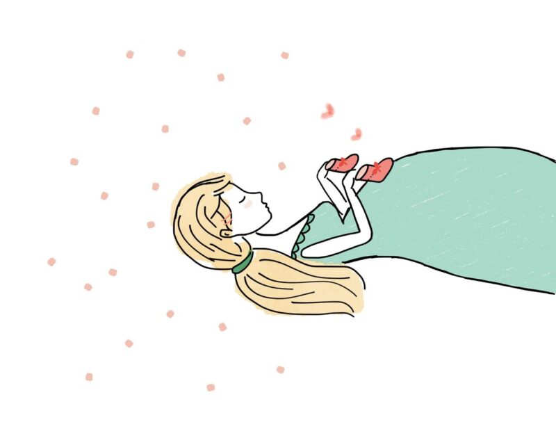 妊婦さんと赤い靴下